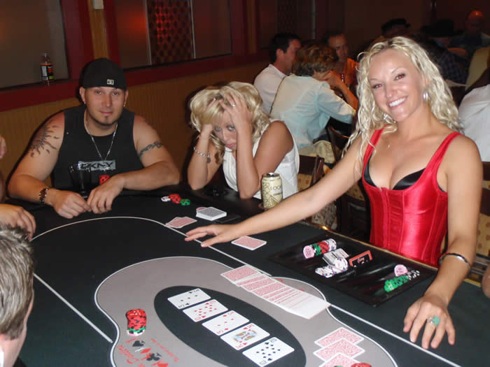 Jaime dealing Texas Hold'em in her red corset