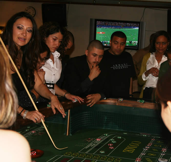 Teaching craps at the Luke Air Force Base's Holiday Party